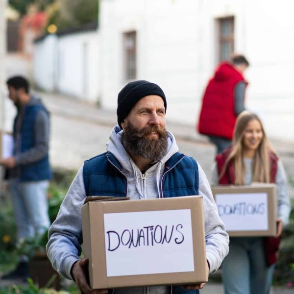 diverse-group-of-volunteers-with-donation-boxes-standing-outdoors-social-care-and-charity-concept.jpg diverse-group-of-volunteers-with-donation-boxes-standing-outdoors-social-care-and-charity-concept.jpg